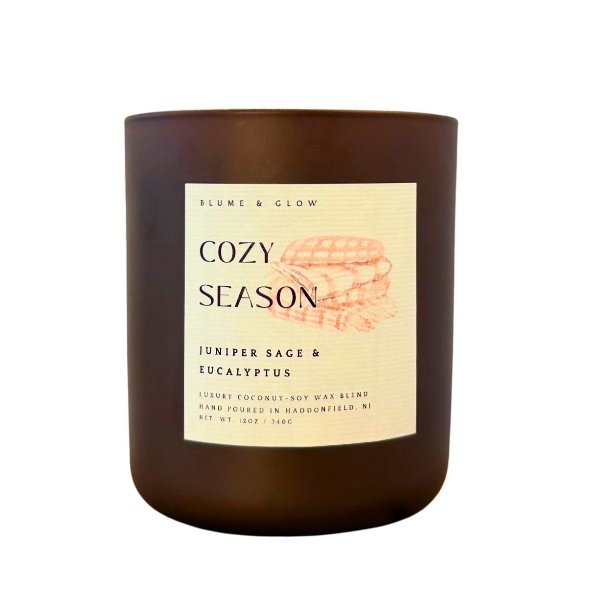 Blume & Glow Cozy Season candle with wooden wick in matte brown jar
