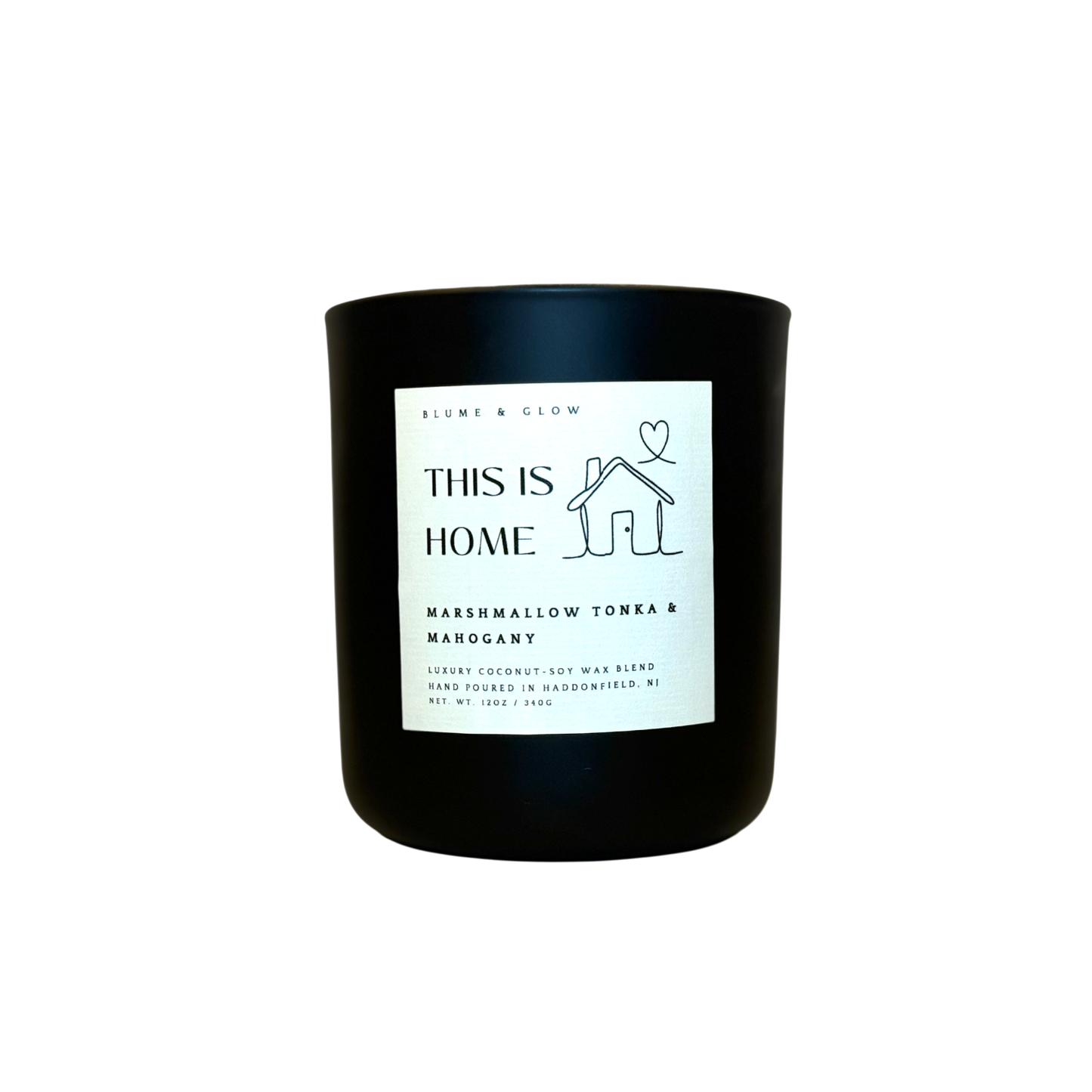 This is Home candle by Blume & Glow with marshmallow vanilla and mahogany scent, wooden wick, the perfect housewarming gift