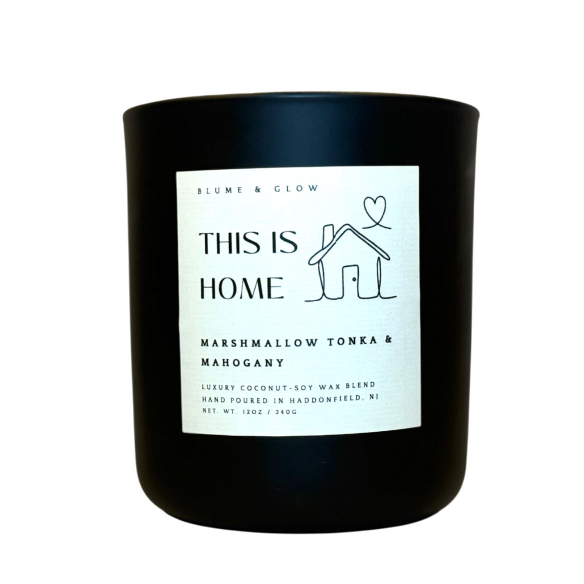 This is Home candle by Blume & Glow with marshmallow vanilla and mahogany scent, wooden wick, the perfect housewarming gift