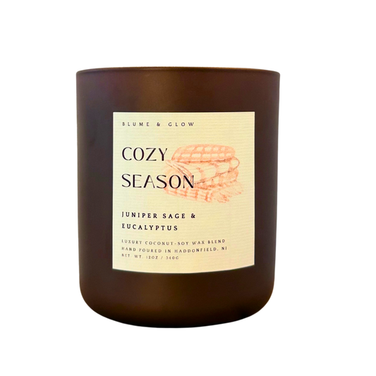 Blume & Glow Cozy Season candle with wooden wick in matte brown jar