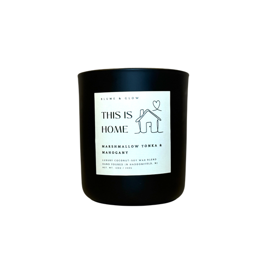 This is Home candle by Blume & Glow with marshmallow vanilla and mahogany scent, wooden wick, the perfect housewarming gift