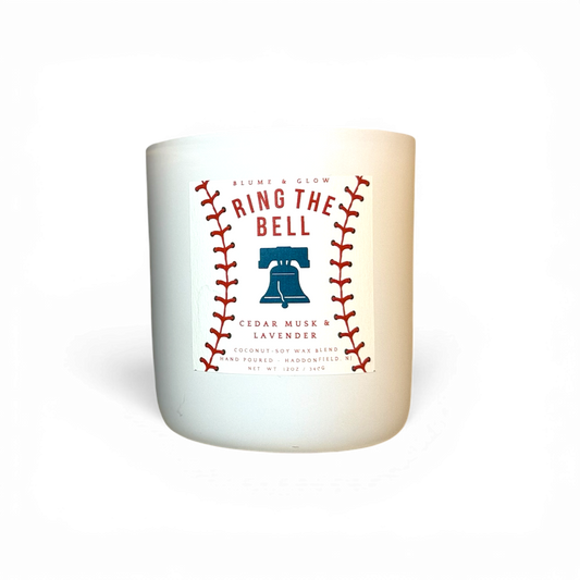 Ring the Bell Philadelphia baseball inspired candle by Blume & Glow with fresh earthy amber scent and wooden wick