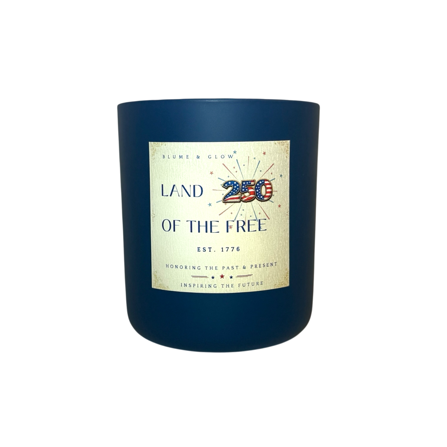 Land of the Free America 250 commemorative candle by Blume & Glow in a navy blue jar with wooden wick and smoky sandalwood fragrance