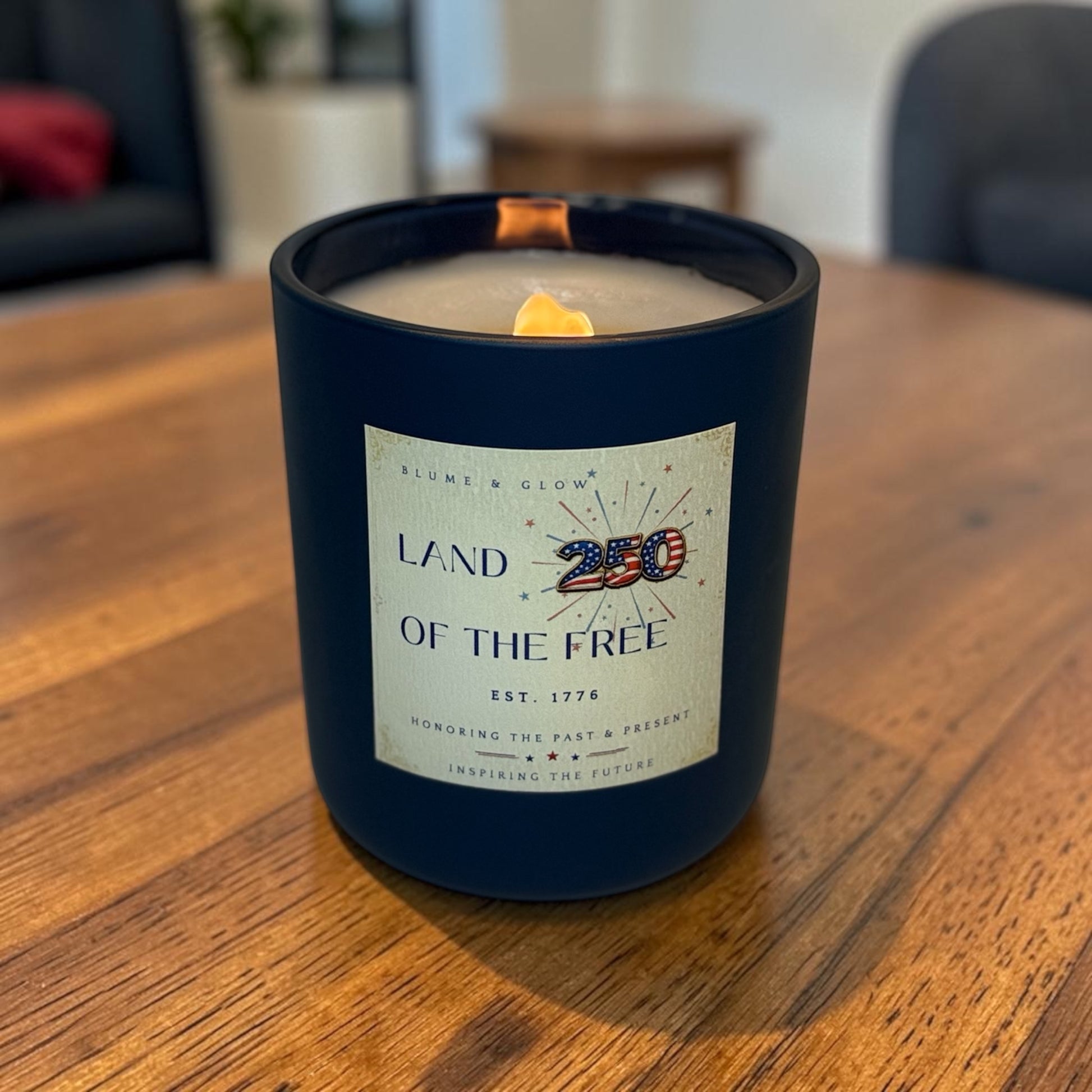 Land of the Free patriotic candle burning with a crackling wooden wick, smoky sandalwood scent, luxury coconut-soy wax blend by Blume & Glow