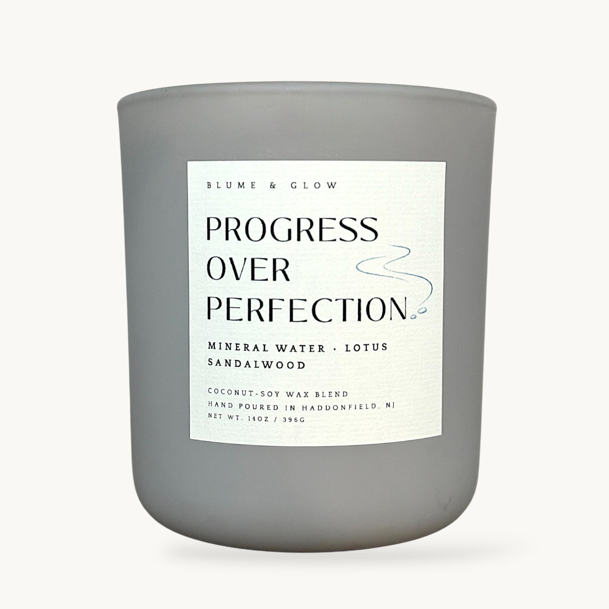 Progress Over Perfection mineral water, lotus, and sandalwood candle by Blume & Glow with wooden wick and coconut-soy wax