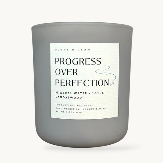 Progress Over Perfection mineral water, lotus, and sandalwood candle by Blume & Glow with wooden wick and coconut-soy wax