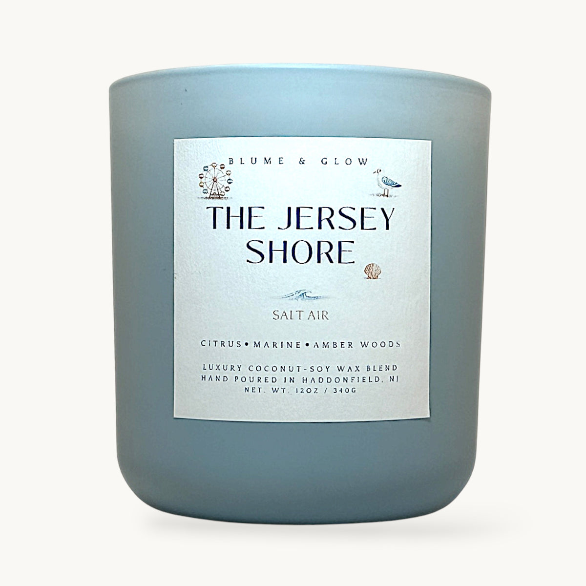 The Jersey Shore candle by Blume & Glow with fresh coastal citrus scent, wooden wick, and luxury coconut-soy wax blend