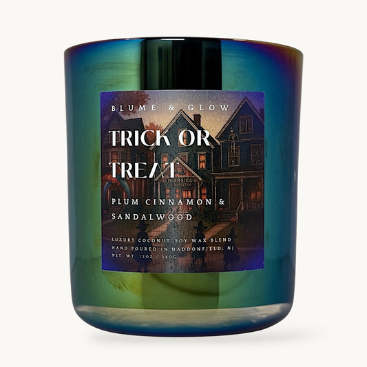 Trick or Treat Haddonfield Halloween candle by Blume & Glow with autumn leaves plum and smoky sandalwood scent and wooden wick