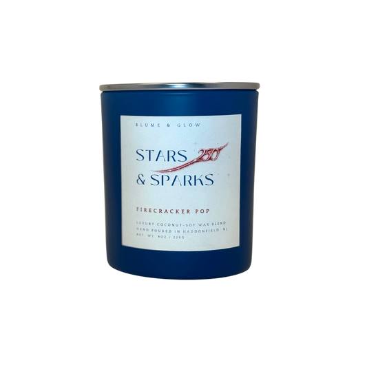 Stars & Sparks America 250 candle by Blume & Glow in a red white and blue patriotic design with Firecracker Popsicle fragrance and wooden wick